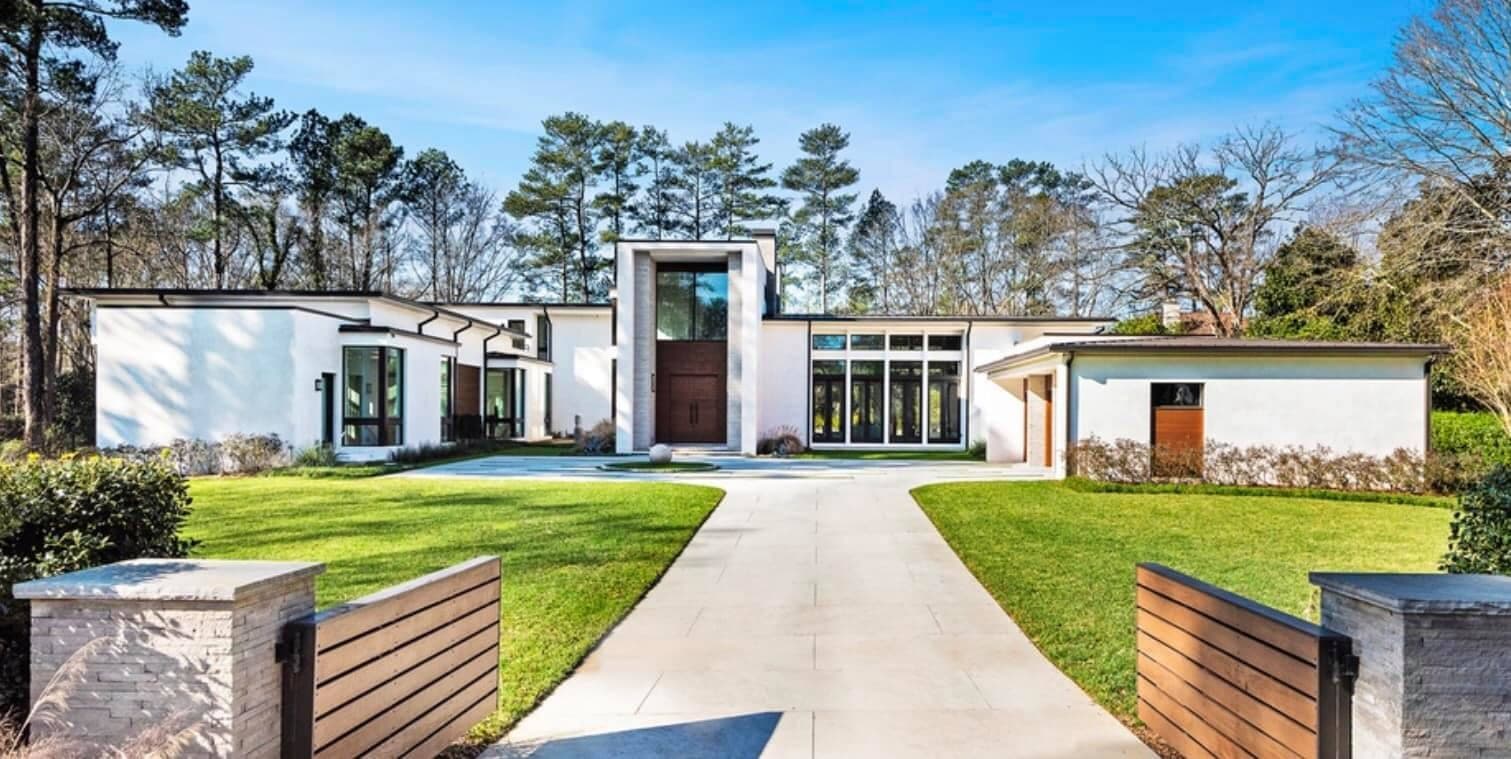 Hand-troweled European stucco façade on a Southeast custom home by Lazar Stucco.